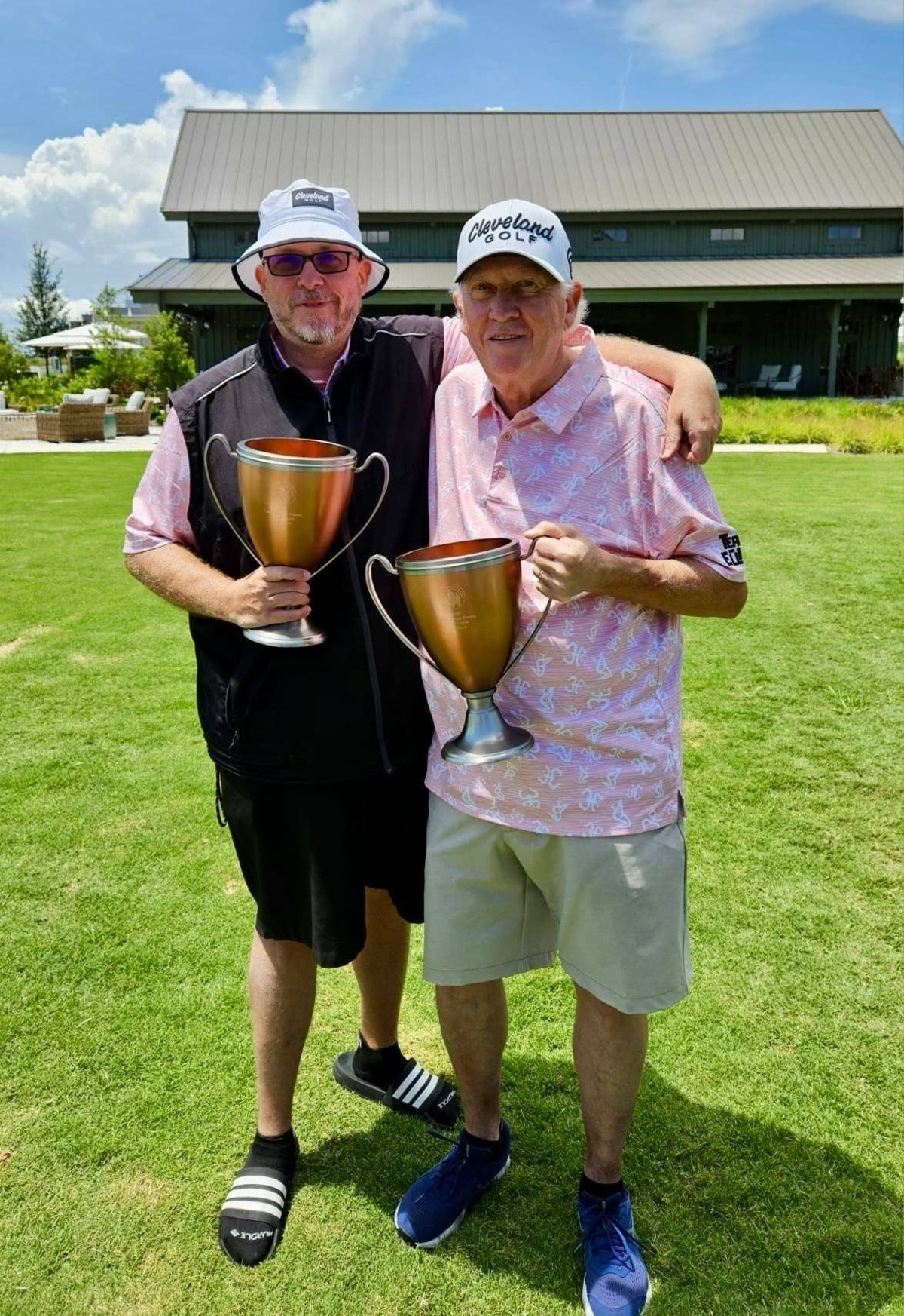  Brendon Elliott and his father, Gary Elliott, celebrate their flight victory at last year's Golfweek Father's Day Open held at Cabot Citrus Farms. Although not the Championship or even the first flight, the pair still had a great time. Credit: Brendon R. Elliott, PGA