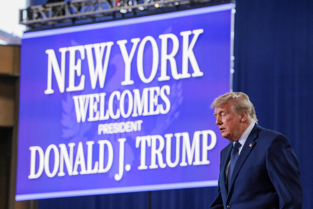 U.S. President Donald Trump stands on the stage on the day he delivers remarks at Rockland Community College in Suffern, New York, U.S., May 22, 2026. REUTERS/Kylie Cooper