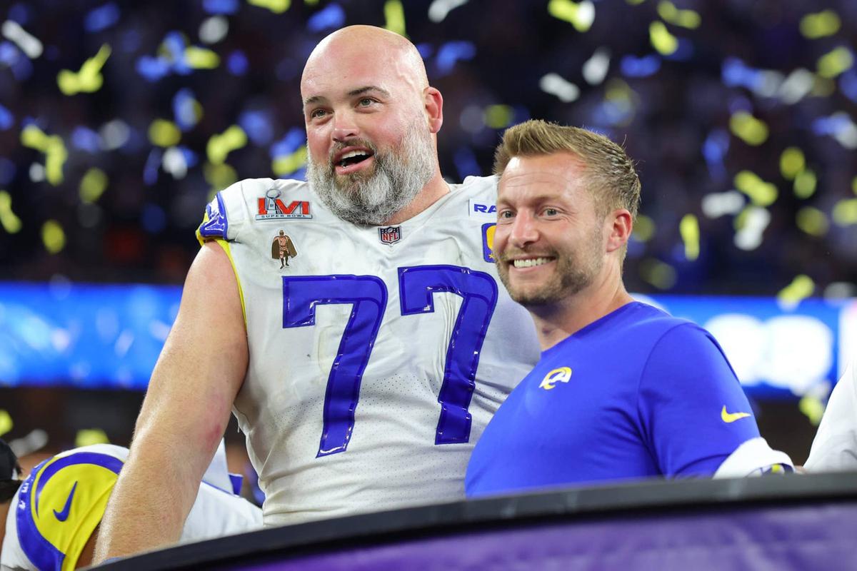  INGLEWOOD, CALIFORNIA - FEBRUARY 13: Head coach Sean McVay of the Los Angeles Rams celebrates with Andrew Whitworth #77 following Super Bowl LVI at SoFi Stadium on February 13, 2022 in Inglewood, California. The Los Angeles Rams defeated the Cincinnati Bengals 23-20. (Photo by Kevin C. Cox/Getty Images) 