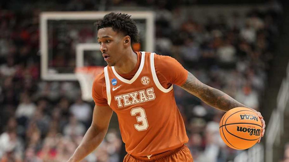  Mar 26, 2026; San Jose, CA, USA; Texas Longhorns forward Dailyn Swain (3) dribbles the ball against the Purdue Boilermakers in the second half during a Sweet Sixteen game of the West Regional of the men's 2026 NCAA Tournament at SAP Center. Mandatory Credit: Kyle Terada-Imagn Images | Kyle Terada-Imagn Images 