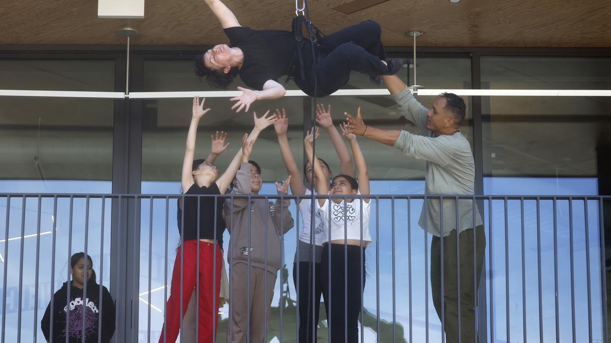 BANDALOOP associate artistic director Damara Vita-Ganley, top center, and EPACENTER dance team members practice at the EPACENTER in East Palo Alto, Calif., on Wednesday, May 20, 2026. (Nhat V. Meyer/Bay Area News Group)