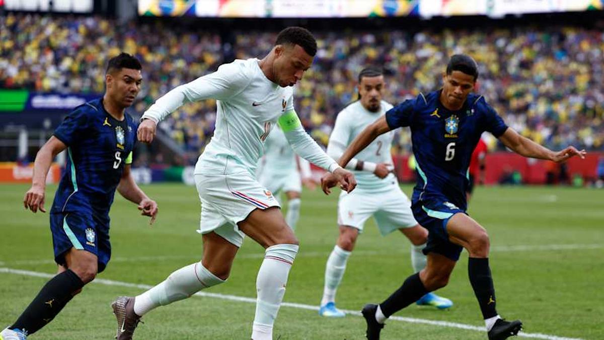  France and Brazil are among Messi's World Cup favorites. | Danielle Parhizkaran/The Boston Globe/Getty Images 