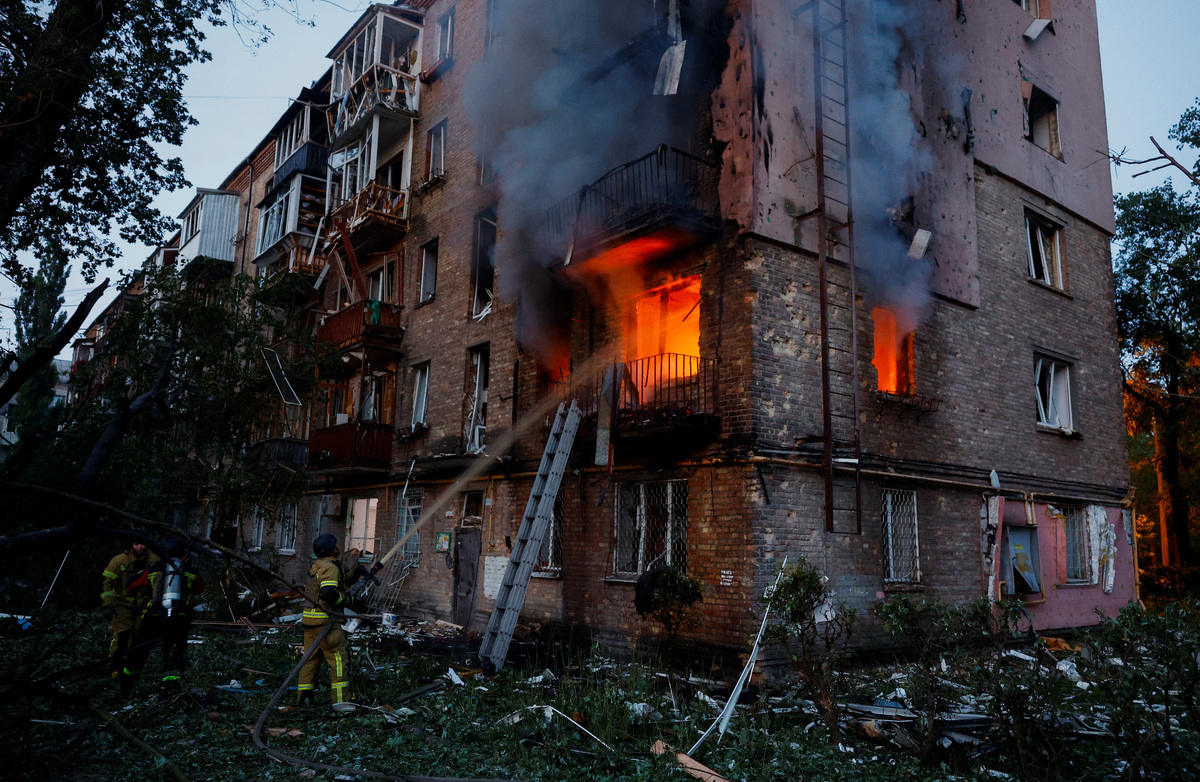Firefighters work at the site of apartment buildings damaged during overnight Russian missile and drone strikes, amid Russia’s attack on Ukraine, in Kyiv, Ukraine, July 2, 2026. REUTERS/Valentyn Ogirenko