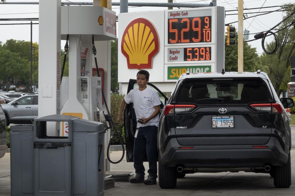  A person fills their car at a Shell gas station in Mount Prospect, Illinois, on May 21, 2026. 