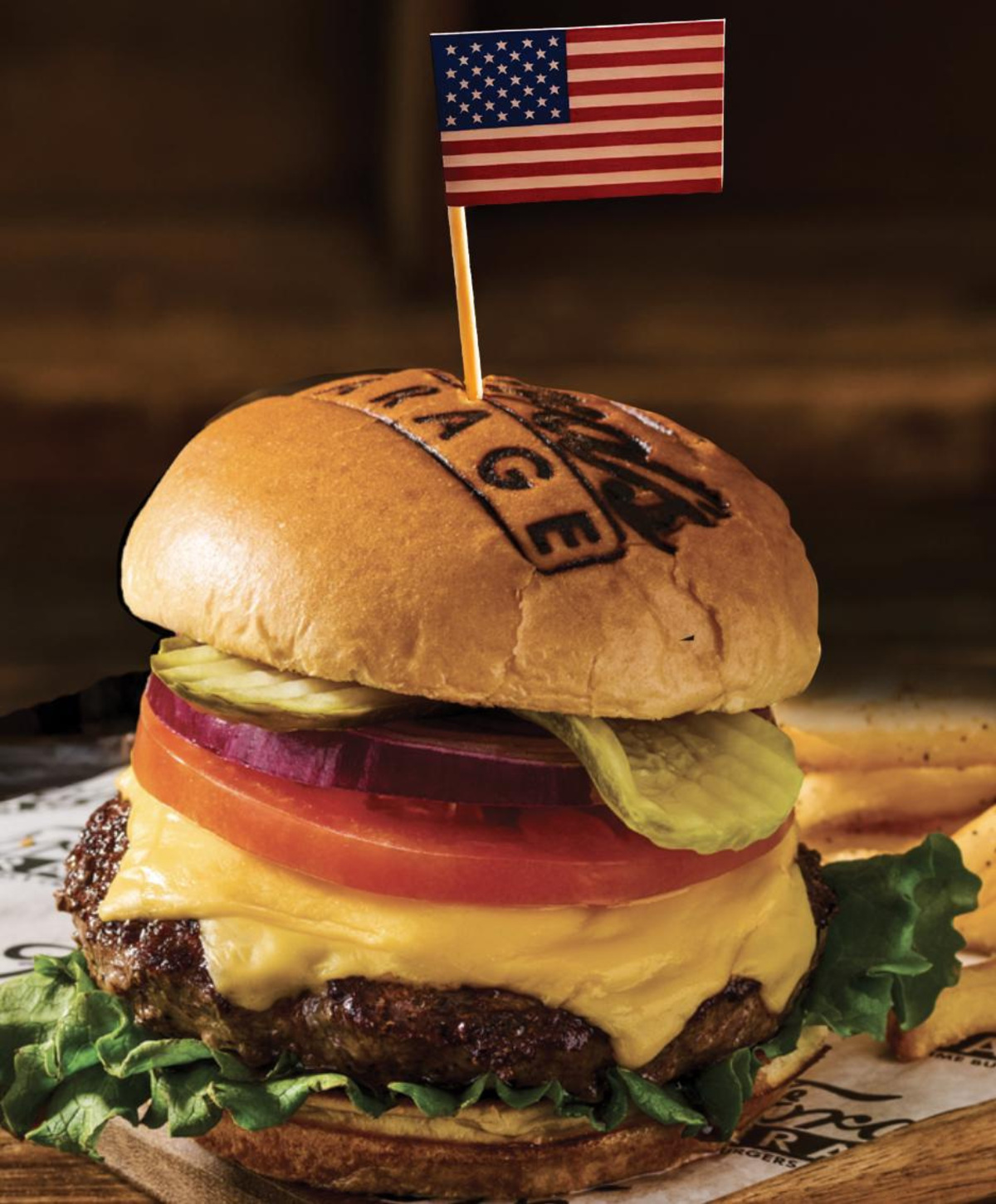 Ford's Garage has a special $17.76 meal deal, available July 1-4. You get an American Standard Burger, fries and select draft beers or a soft drink.