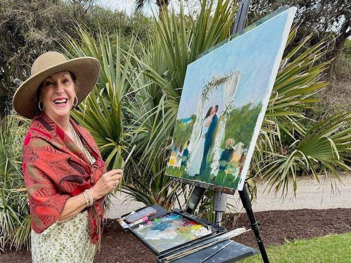 Artist at her easel, painting the couple during their vows. Photo credit: Sharon Kurtz 