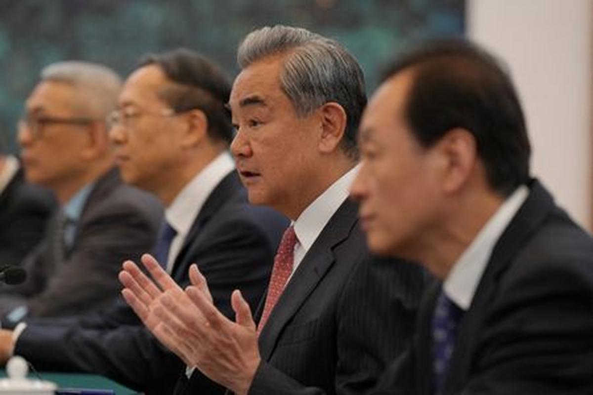 Chinese Foreign Minister Wang Yi speaks to U.S. Senator Steve Daines and congressional delegation at the Great Hall of the People, in Beijing, China, May 7, 2026. Andy Wong/Pool via REUTERS