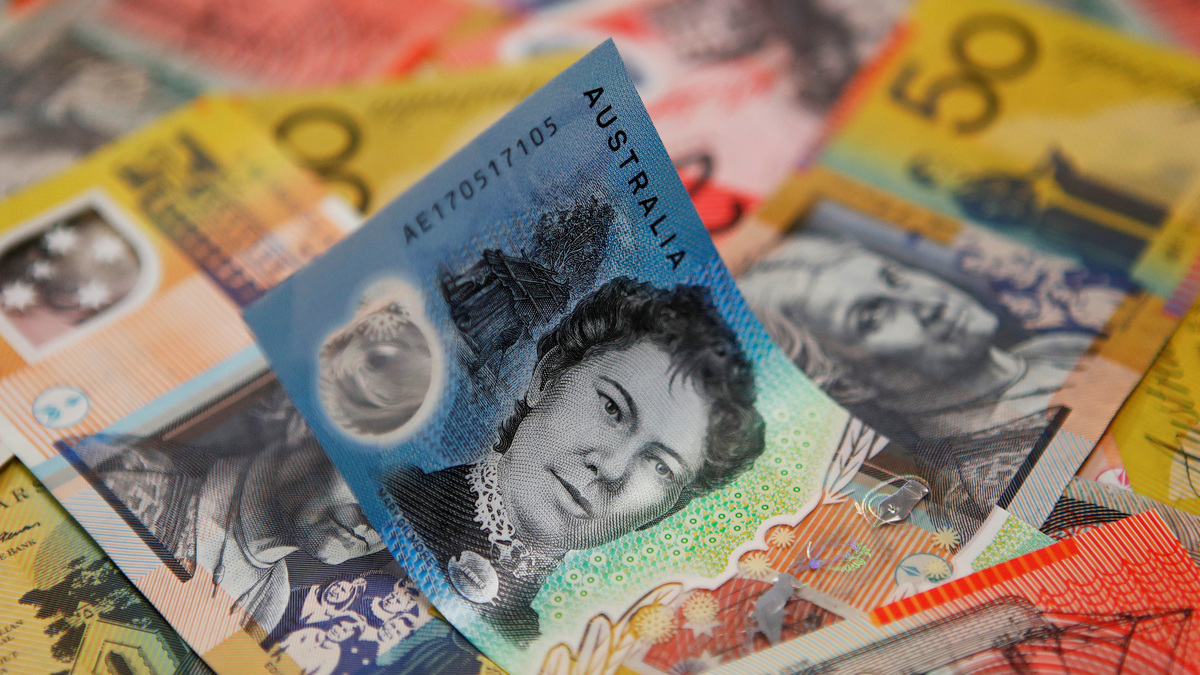 Australian dollars are seen in an illustration photo February 8, 2018. REUTERS/Daniel Munoz