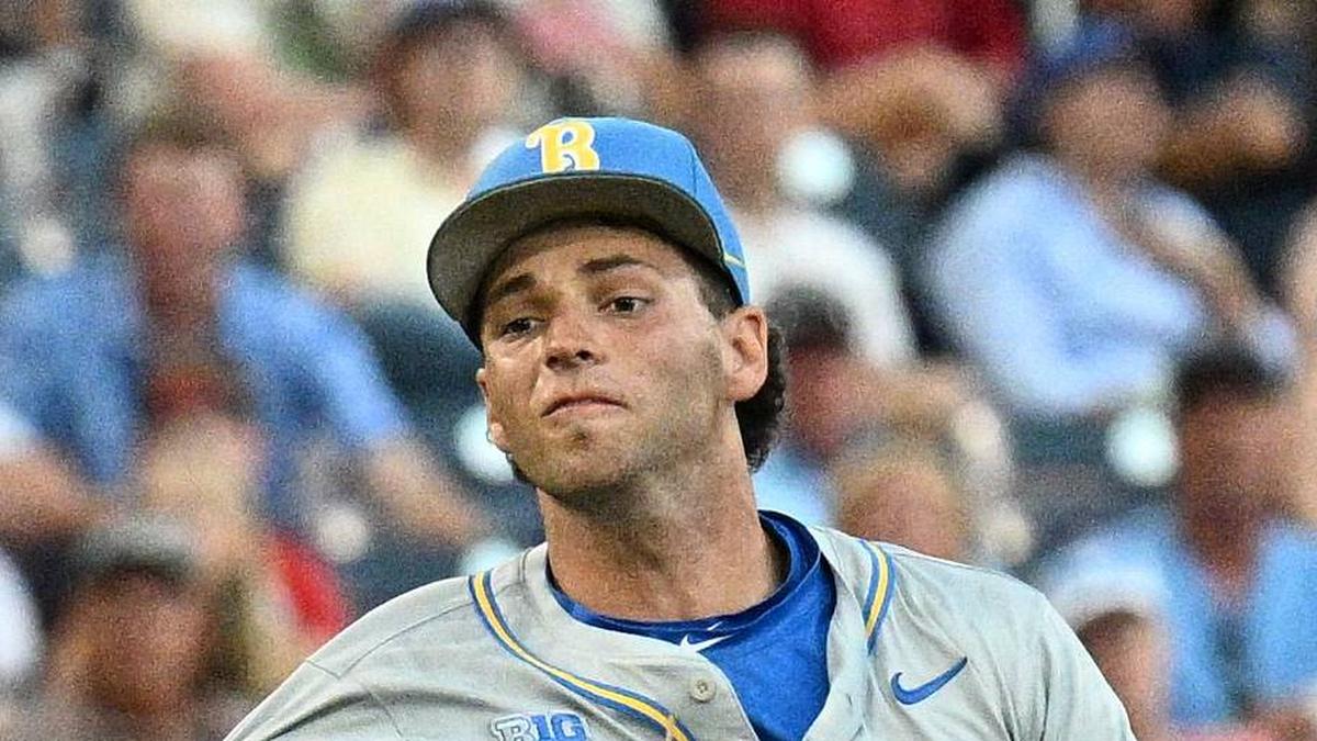  Jun 17, 2025; Omaha, Neb, USA; UCLA Bruins shortstop Roch Cholowsky (1) throws to first base against the Arkansas Razorbacks during the third inning at Charles Schwab Field. Mandatory Credit: Steven Branscombe-Imagn Images | Steven Branscombe-Imagn Images 