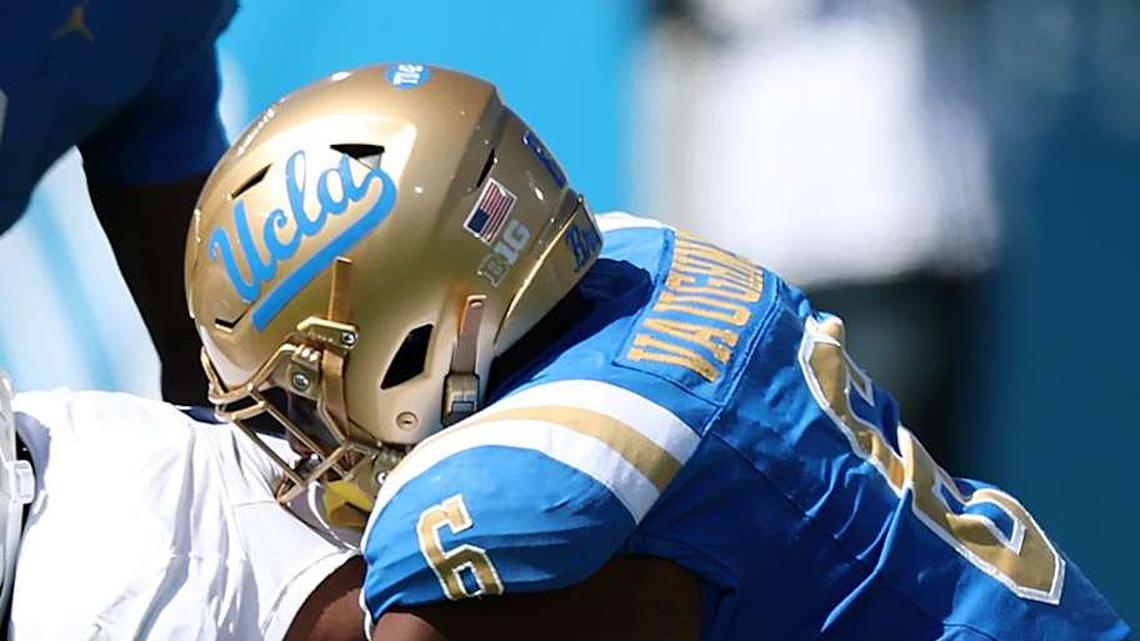  Oct 4, 2025; Pasadena, California, USA; Penn State Nittany Lions wide receiver Kyron Hudson (1) is tackled by UCLA Bruins linebacker Jonjon Vaughns (6) during the first half at Rose Bowl. Mandatory Credit: Kiyoshi Mio-Imagn Images | Kiyoshi Mio-Imagn Images 