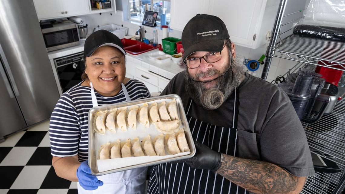 Shannon and Stuart Brantley in their home kitchen with dumplings they will sell from their Woodland Hills home on Tuesday, Nov. 12, 2024. The pair were the first in Los Angeles County to receive a Microenterprise Home Kitchen Operation (MEHKO) permit. The were able acquire a permit for their home kitchen under the state’s Homemade Food Operations Act, which allows municipalities to opt-in. There is a need for affordable certified kitchens in Sacramento, according to a business consultant with the Hispanic Chamber of Commerce. Sacramento County, as of March 2024, had yet to opt-in to the law. (Photo by David Crane, Los Angeles Daily News/SCNG)