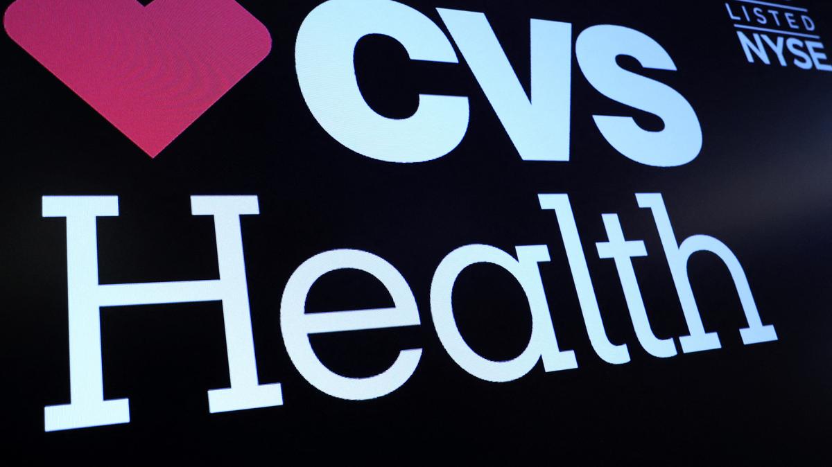 A screen displays the logo and trading information for CVS Health on the floor at the New York Stock Exchange (NYSE) in New York City, U.S., December 6, 2023.  REUTERS/Brendan McDermid