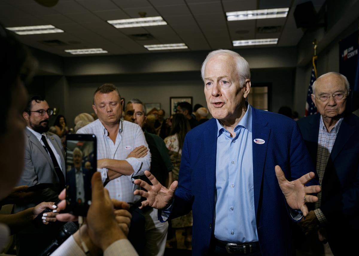 FILE -- Sen. John Cornyn (R-Texas) speaks to reporters following a campaign event in San Antonio, May 18, 2026. Republican senators reacted angrily on Tuesday to President Donald Trump's decision to endorse Ken Paxton, the Texas attorney general, in the state's Senate primary runoff, warning that his snub of the incumbent Sen. John Cornyn could risk the seat and the party's fight to keep its majority. (Jordan Vonderhaar/The New York Times)