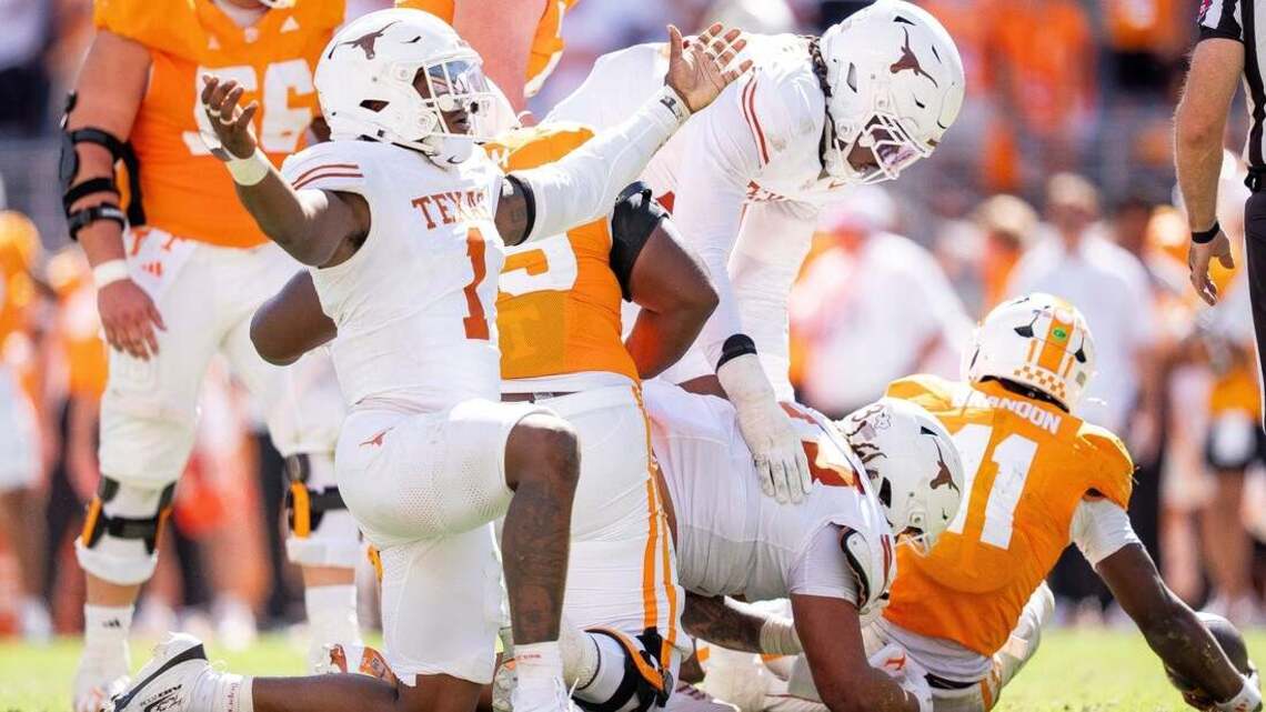 Top 25 roundup: No. 1 Texas holds off No. 14 Tennessee  