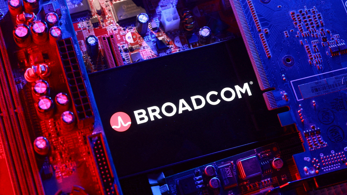 FILE PHOTO: A Broadcom logo and a computer motherboard appear in this illustration created on August 25, 2025. REUTERS/Dado Ruvic/Illustration/File Photo