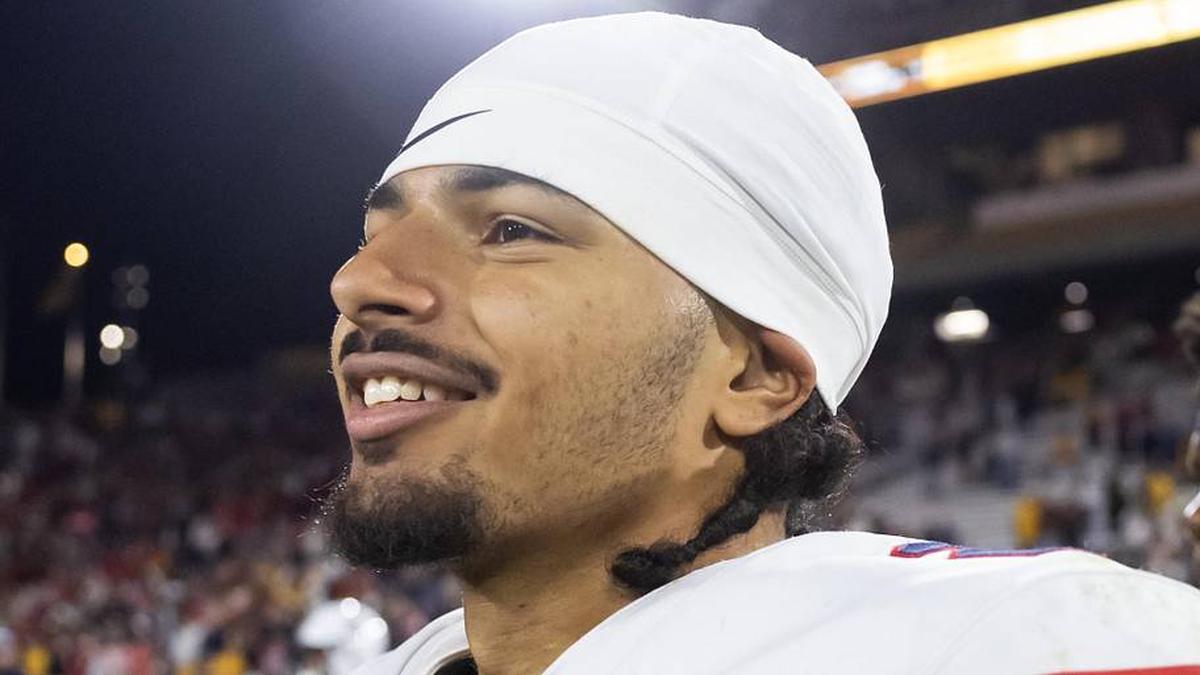  Nov 28, 2025; Tempe, Arizona, USA; Arizona Wildcats defensive back Treydan Stukes (2) celebrates after defeating the Arizona State Sun Devils during the 99th Territorial Cup at Mountain America Stadium. Mandatory Credit: Mark J. Rebilas-Imagn Images | Mark J. Rebilas-Imagn Images 