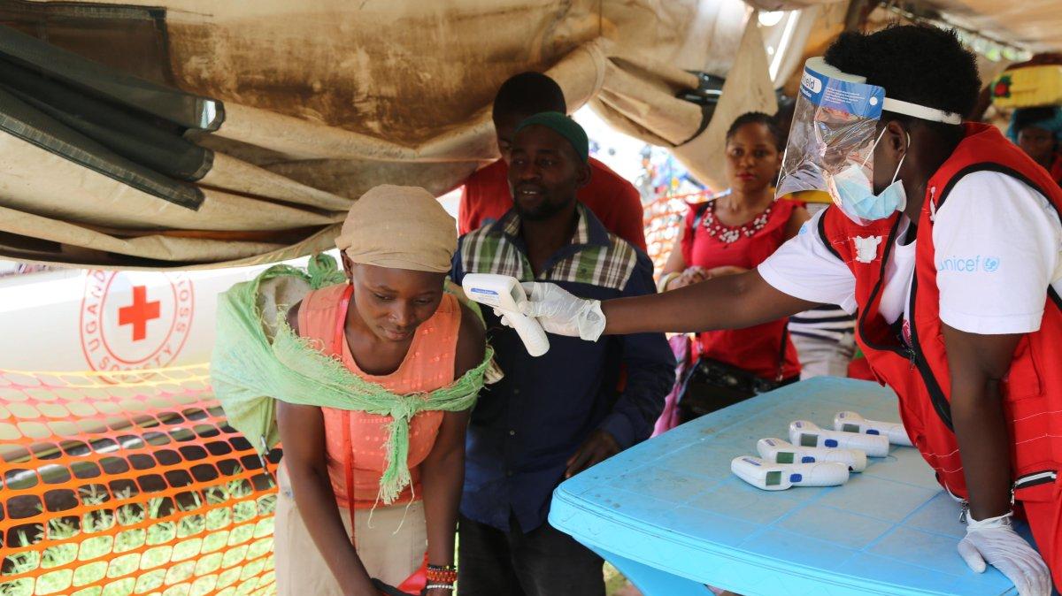 A handout photo made available by the World Health Organization shows temperature screening at Mpondwe border point with the Democratic Republic of Congo, near Bwera, Uganda, in May 2019. The Democratic Republic of Congo declared an Ebola outbreak on Friday as 65 people have died from the disease in the country’s eastern region. File Photo by the World Health Organization/EPA-EFE