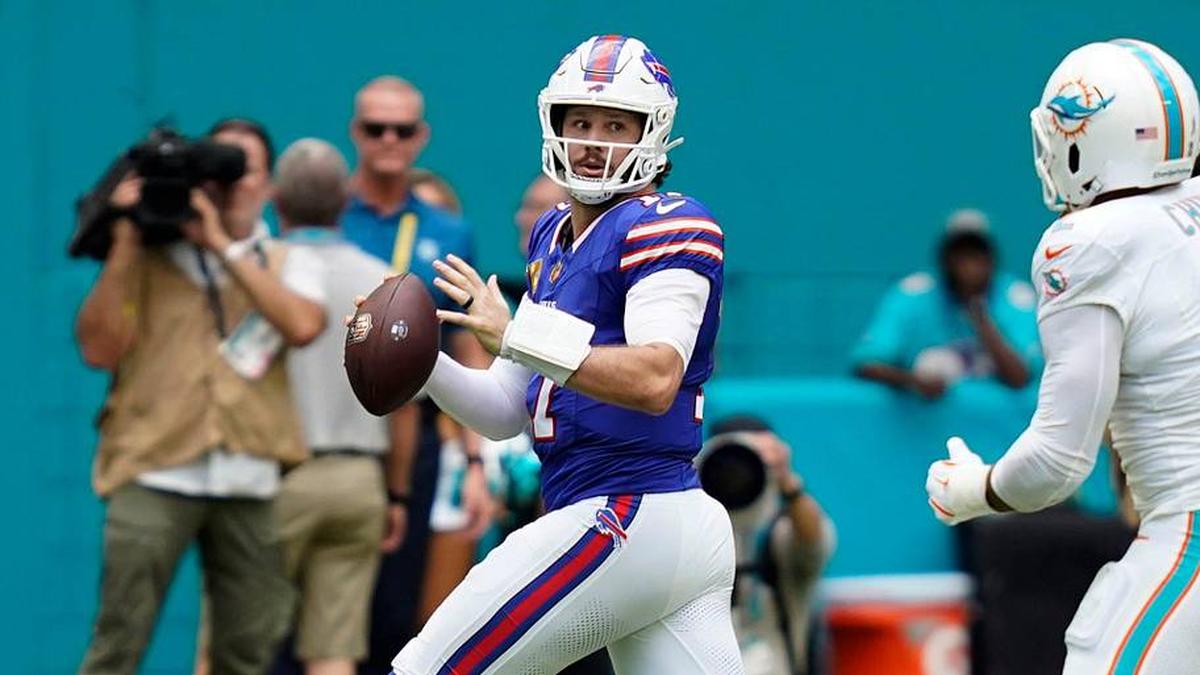 Nov 9, 2025; Miami Gardens, Florida, USA; Buffalo Bills quarterback Josh Allen (17) scrambles against Miami Dolphins linebacker Bradley Chubb (2) during the first half at Hard Rock Stadium. Mandatory Credit: Jeff Romance-Imagn Images | Jeff Romance / USA TODAY NETWORK via Imagn Images 