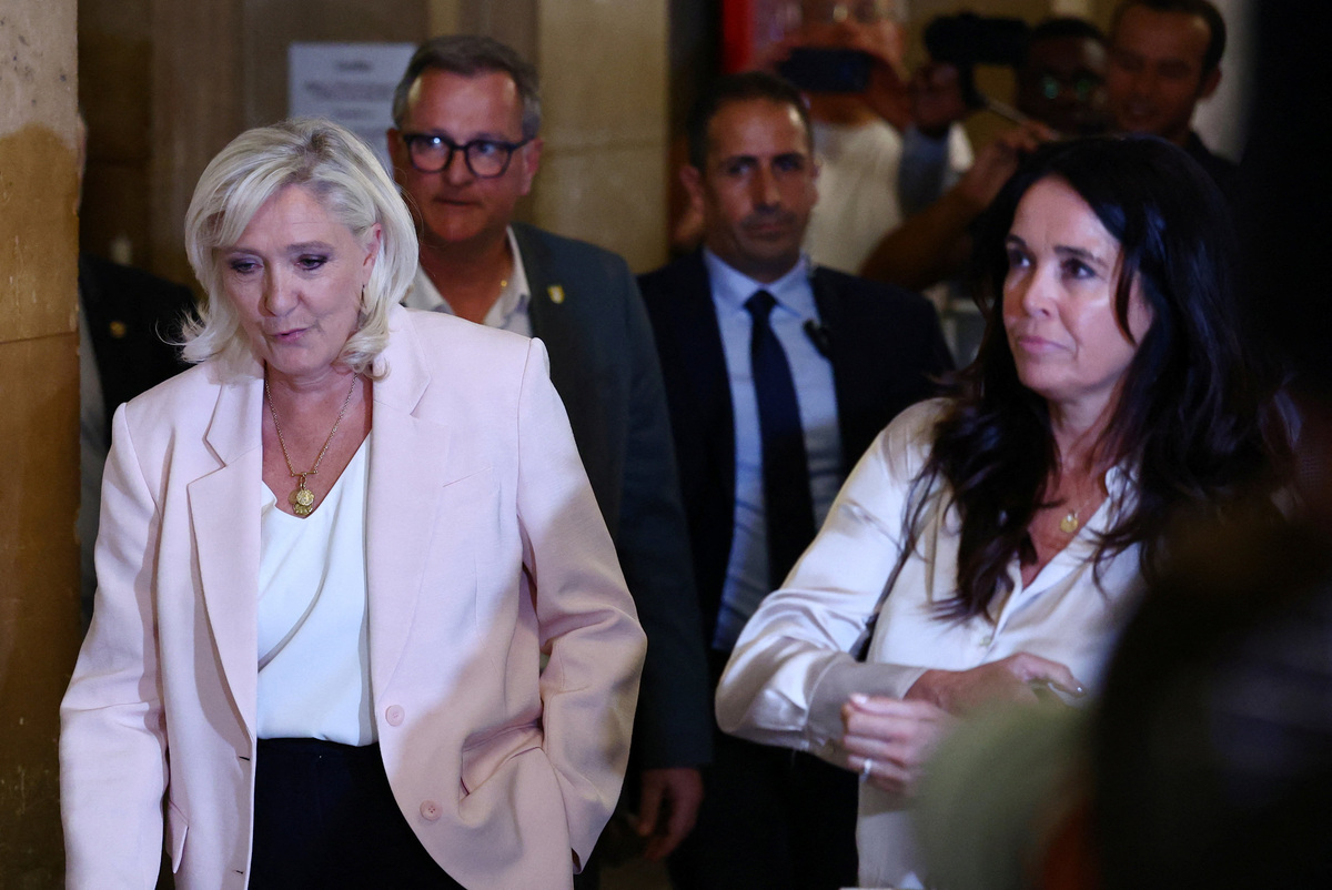 French far-right leader Marine Le Pen, member of parliament for the Rassemblement National (National Rally - RN) party, arrives to attend the verdict in her appeal trial, alongside the RN party itself and 10 others defendants found guilty of diverting European Parliament funds, at the Paris courthouse on the Ile de la Cite, in Paris, France, July 7, 2026. REUTERS/Sarah Meyssonnier