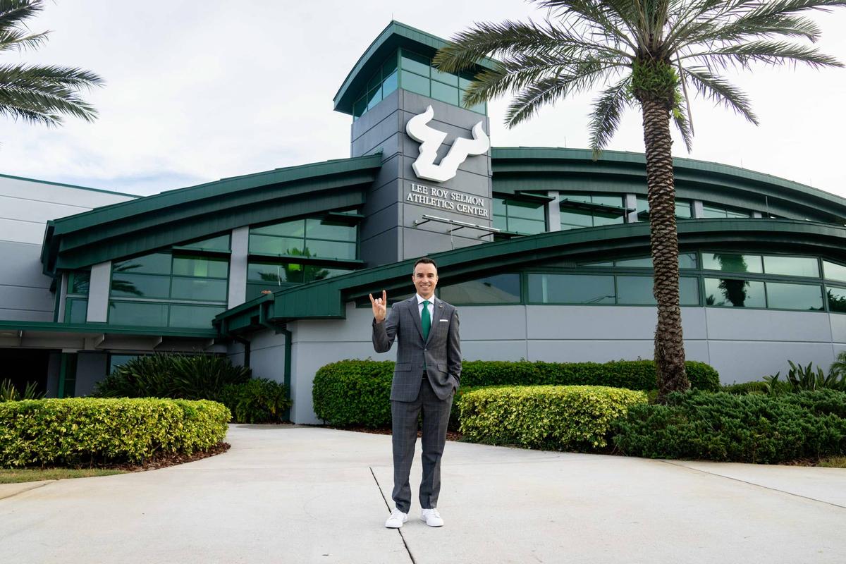 Rob Higgins poses for a photo outside of the Lee Roy Selmon Athletics Center before his introductory event on Sept. 22, 2025. USF athletics photo