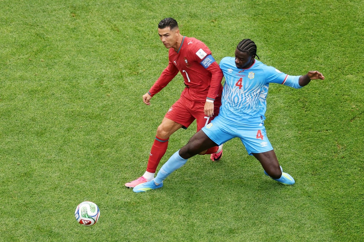  Cristiano Ronaldo #7 of Portugal is challenged by Axel Tuanzebe #4 of Congo DR during the FIFA World Cup 2026 Group K match between Portugal and Congo DR at Houston Stadium. Lars Baron/Getty Images