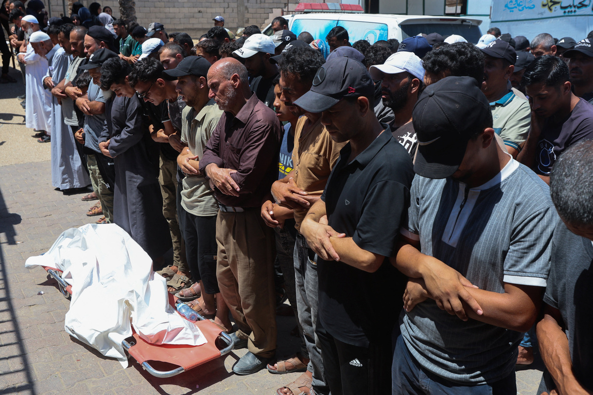 Mourners attend the funeral of Palestinian child Muataz Abu Shaar,  who was killed by Israeli fire, according to medics, in Khan Younis, in the southern Gaza Strip, July 14, 2026. REUTERS/Ramadan Abed