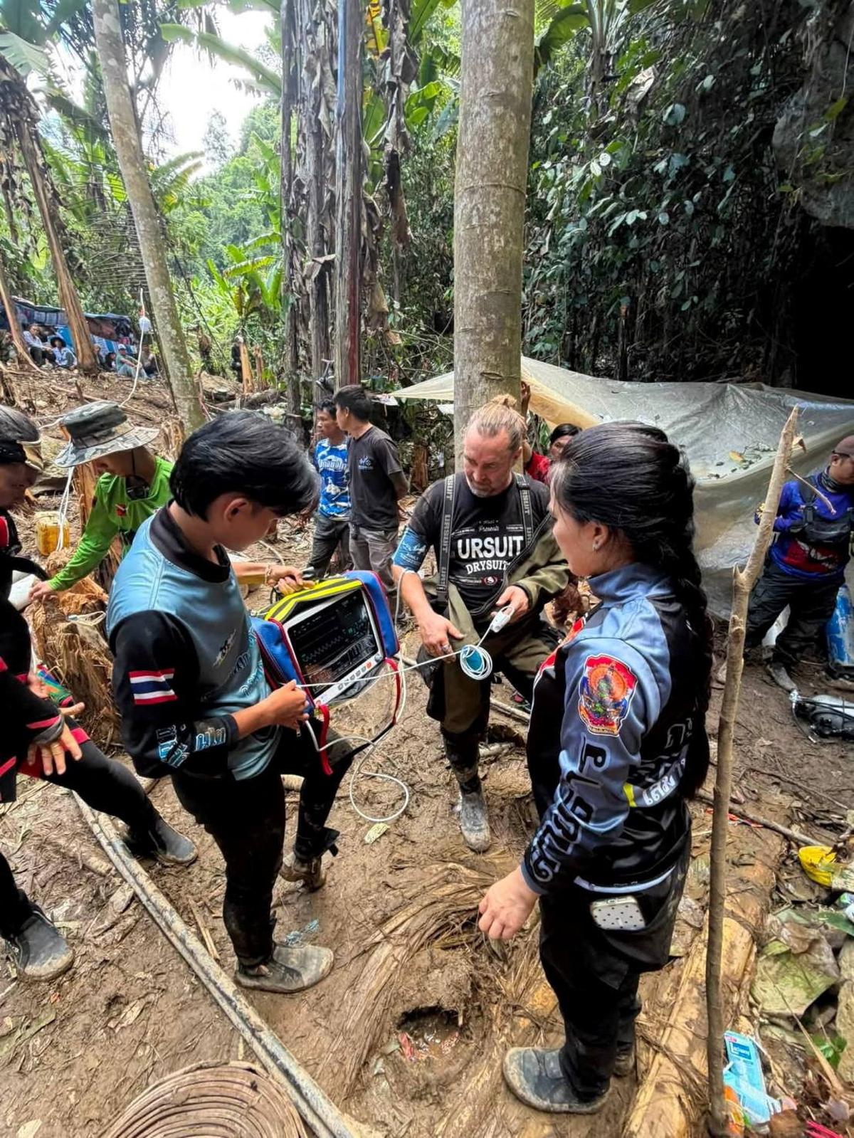 Members of a rescue team work to save seven people trapped in a cave, at a location given as Xaisomboun Province, Laos, in this handout image released May 26, 2026. Metta Tham Kalasin Rescue/Handout via REUTERS