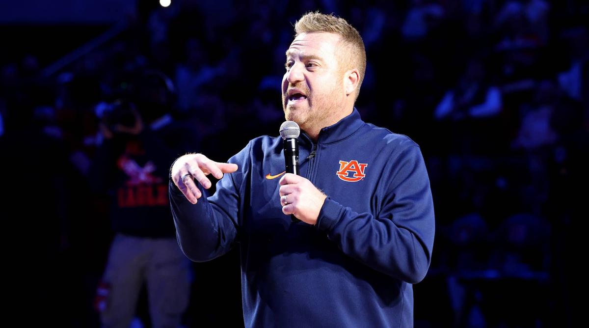  Auburn head coach Alex Golesh is introduced during a basketball game between the Tigers and NC State at Neville Arena on Dec. 3, 2025, in Auburn, Alabama. © John Reed-Imagn Images