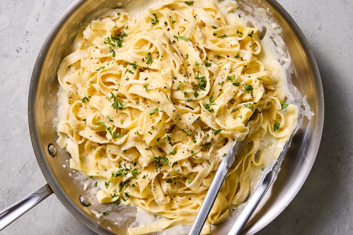 Elaine's fettuccine alfredo. The restaurant Elaine's in Manhattan was famous for attracting celebrity regulars, but its fettuccine Alfredo deserves notoriety among home cooks. Food styled by Simon Andrews. (Christopher Testani/The New York Times)
