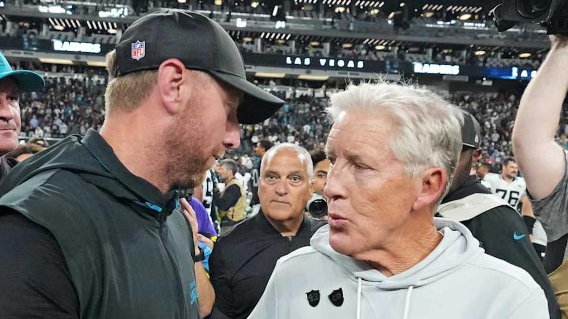  Nov 2, 2025; Paradise, Nevada, USA; The Jacksonville Jaguars head coach Liam Coen and the Las Vegas Raiders head coach Pete Carroll meet after the win against the Las Vegas Raiders at Allegiant Stadium. Mandatory Credit: Kirby Lee-Imagn Images | Kirby Lee-Imagn Images 
