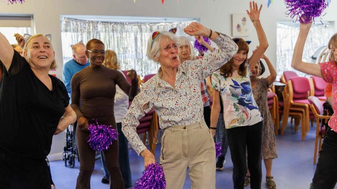 People feel the tunes during a day rave in England. (Omaze via SWNS). 