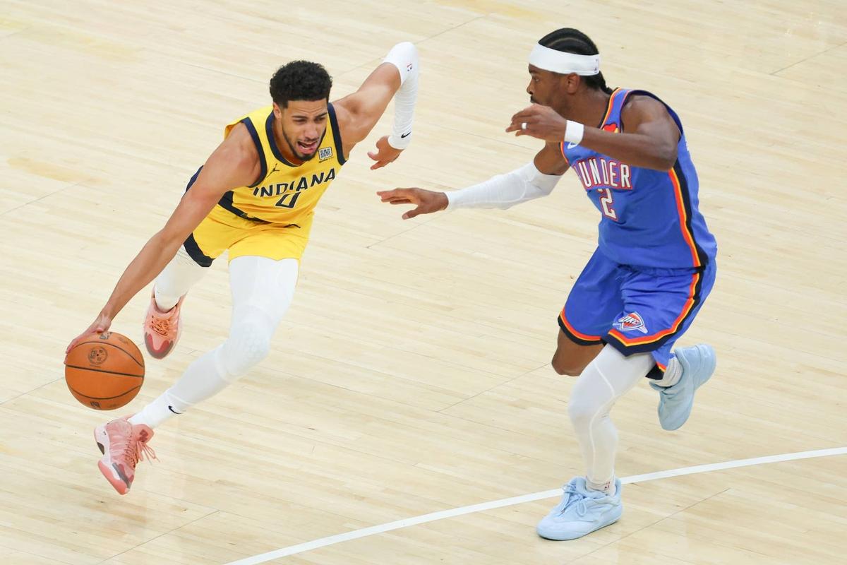  Indiana Pacers guard Tyrese Haliburton drives with the ball against Oklahoma City Thunder guard Shai Gilgeous-Alexander during Game 6 of the 2025 NBA Finals at Gainbridge Fieldhouse on June 19, 2025. Trevor Ruszkowski-Imagn Images