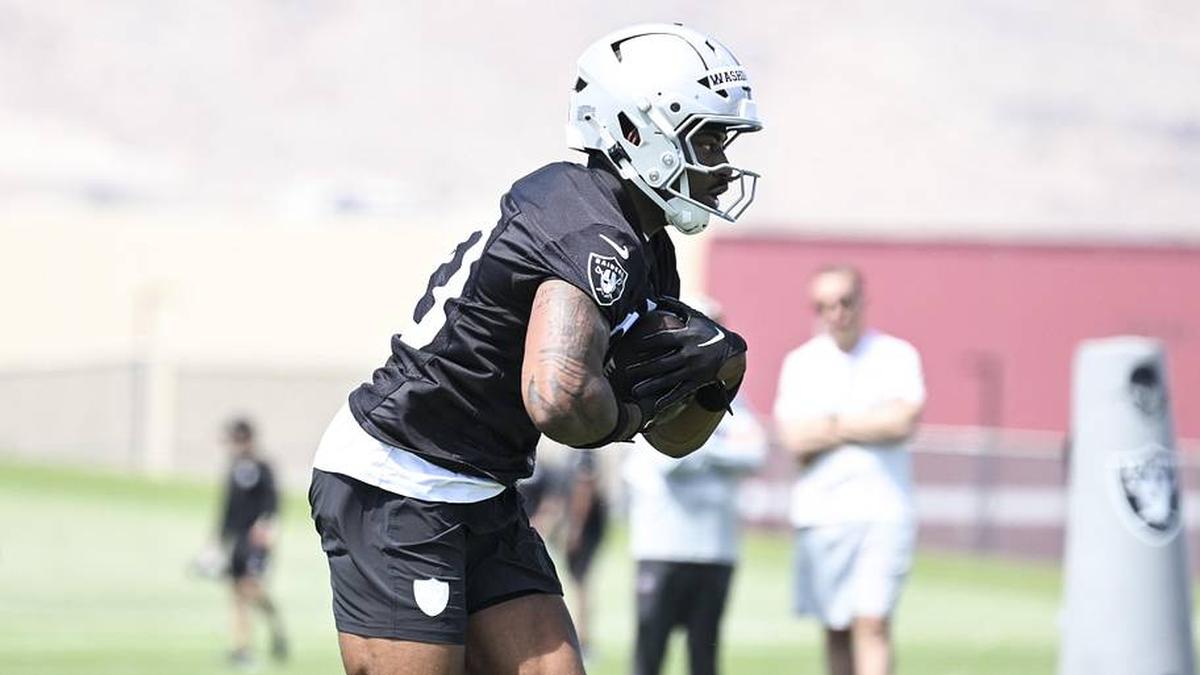  May 2, 2026; Henderson, NV, USA; Las Vegas Raiders running back Mike Washington Jr. (30) runs through a drill during a Rookie Minicamp at Intermountain Health Performance Center. Mandatory Credit: Candice Ward-Imagn Images | Candice Ward-Imagn Images 