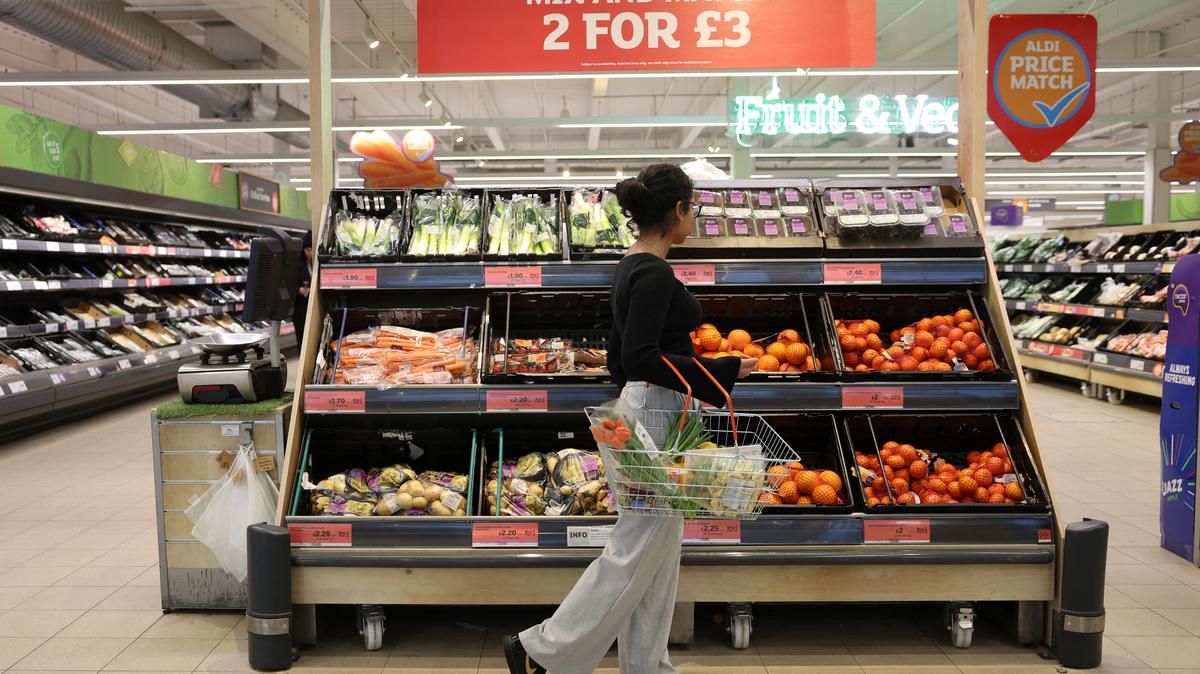 A customer shops in the fruit aisle inside a Sainsbury's supermarket, in Richmond, West London, Britain February 21, 2024. REUTERS/Isabel Infantes