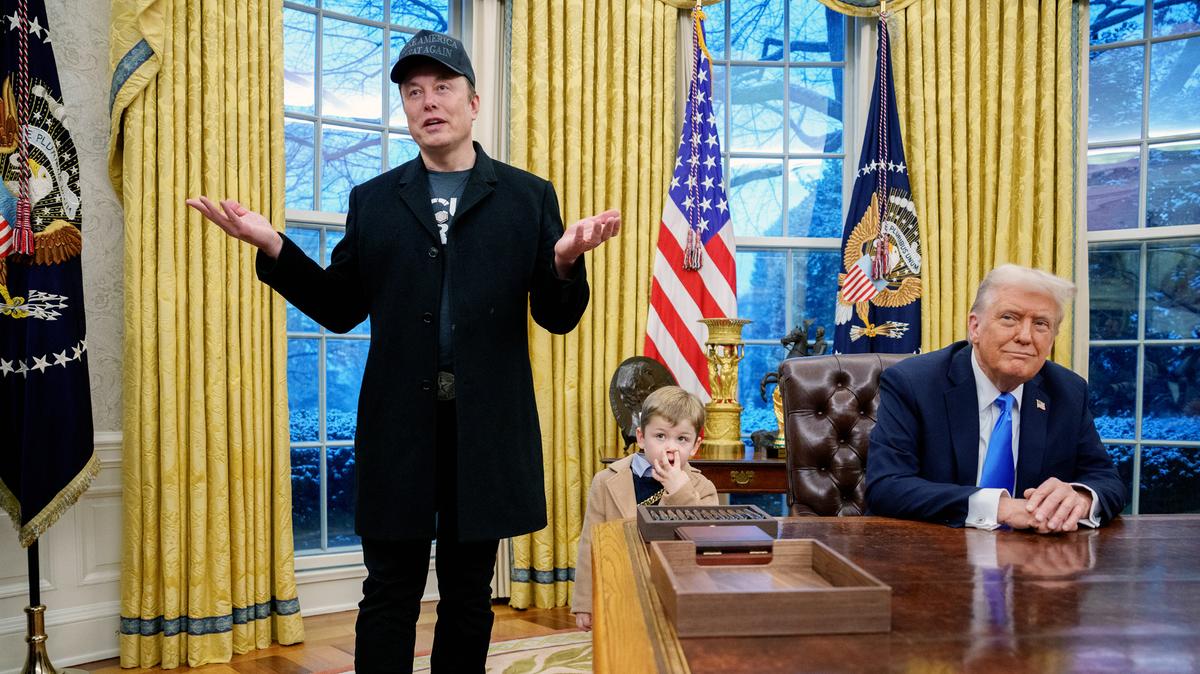 Tesla and SpaceX CEO Elon Musk, accompanied by U.S. President Donald Trump (R), and his son X Musk, speaks during an executive order signing in the Oval Office at the White House on Feb. 11, 2025, in Washington, DC. Trump is to sign an executive order implementing the Department of Government Efficiency’s (DOGE) “workforce optimization initiative,” which, according to Trump, will encourage agencies to limit hiring and reduce the size of the federal government. (Andrew Harnik/Getty Images/TNS)