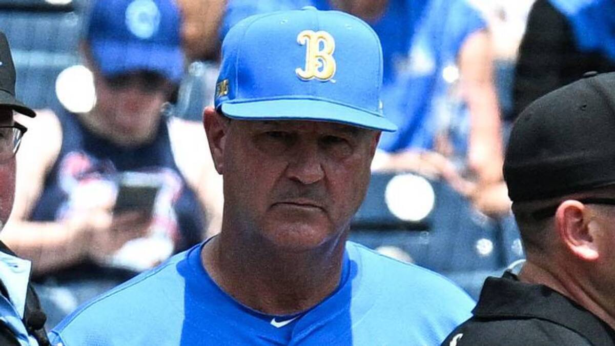  Jun 14, 2025; Omaha, Neb, USA; Murray State Racers head coach Dan Skirka and UCLA Bruins head coach John Savage meet with umpires before the game at Charles Schwab Field. Mandatory Credit: Steven Branscombe-Imagn Images | Steven Branscombe-Imagn Images 