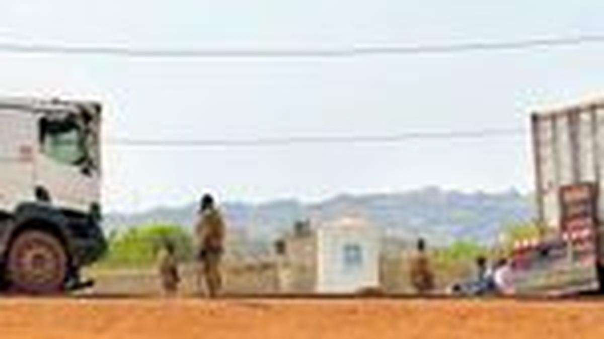 FILE PHOTO: Malian soldiers stand near a truck during a patrol following the attack on Mali's main military base Kati, outside the capital Bamako, in Kati, Mali, April 27, 2026. Picture taken with a mobile phone.   REUTERS/Stringer/File Photo