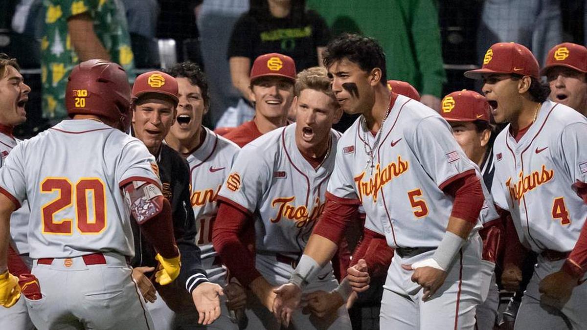  USC celebrates a home run by Isaac Cadena (20) as the Oregon Ducks host the USC Trojans on May 14, 2026, in Eugene, Oregon. | Ben Lonergan/The Register-Guard / USA TODAY NETWORK via Imagn Images 