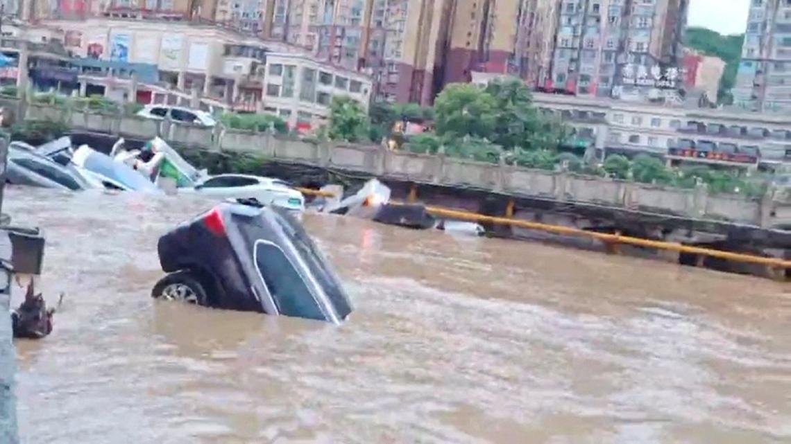 At least 21 killed as heavy rains drench southern, central China