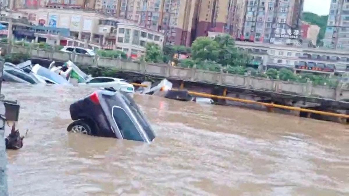 Cars partially submerged in floodwaters after heavy rainfall in Duyun, Guizhou Province, China, May 19, 2026, in this still image obtained from a social media video. Social Media/via REUTERS