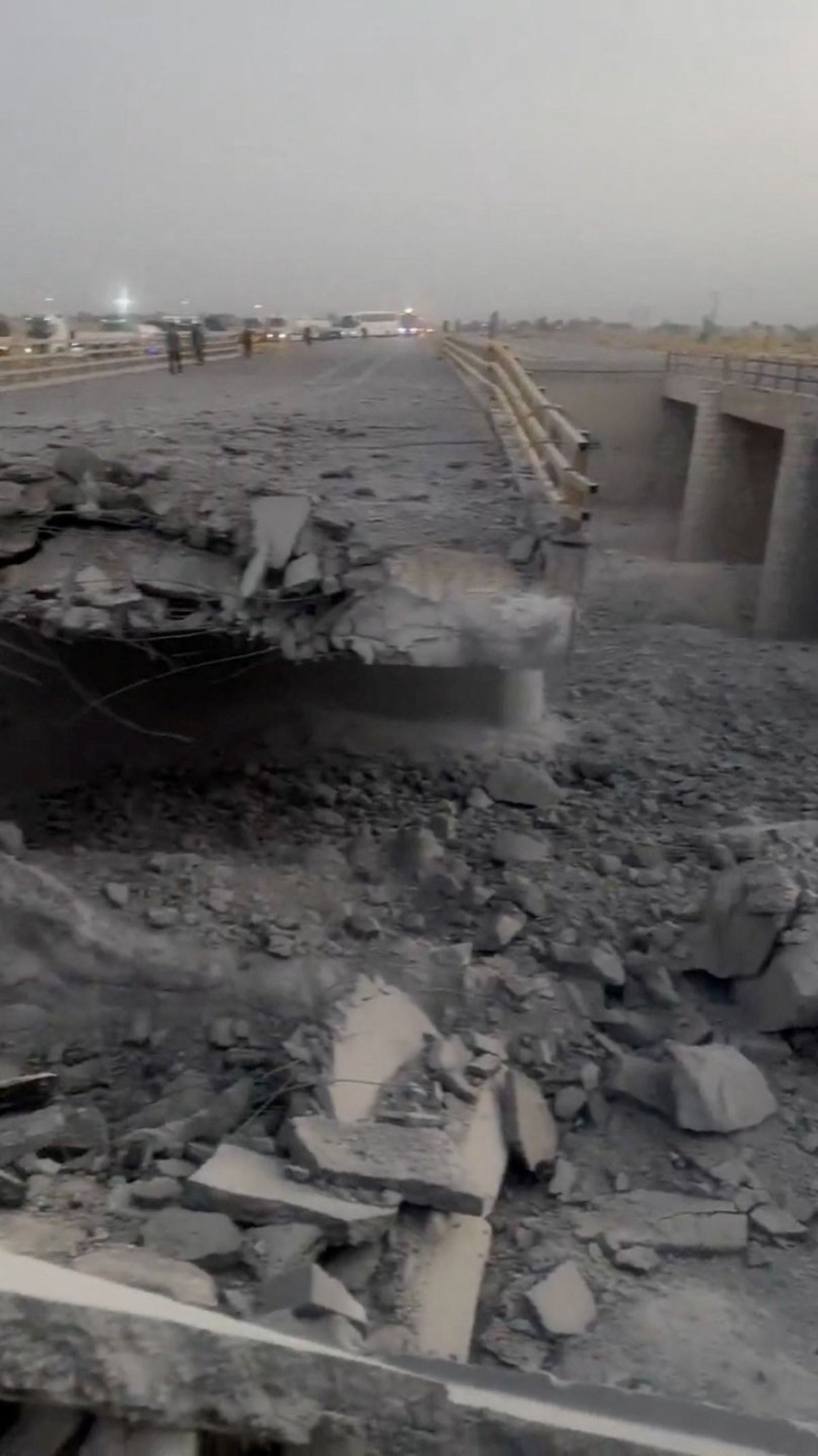 A damaged portion of a bridge in the aftermath of a strike, in Bandar Khamir, Hormozgan province, Iran July 17, 2026 in this screen grab obtained from social media video. Social Media/via REUTERS