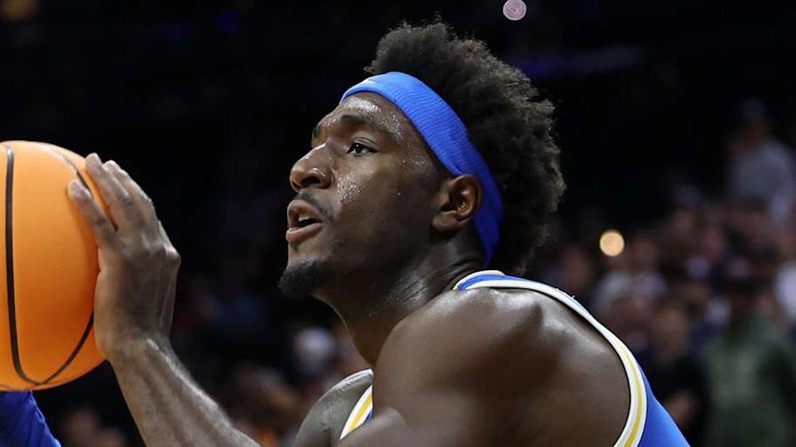  Mar 22, 2026; Philadelphia, PA, USA; UCLA Bruins forward Eric Dailey Jr. (3) shoots the ball against the UConn Huskies in the second half during a second round game of the men's 2026 NCAA Tournament at Xfinity Mobile Arena. Mandatory Credit: Bill Streicher-Imagn Images | Bill Streicher-Imagn Images 