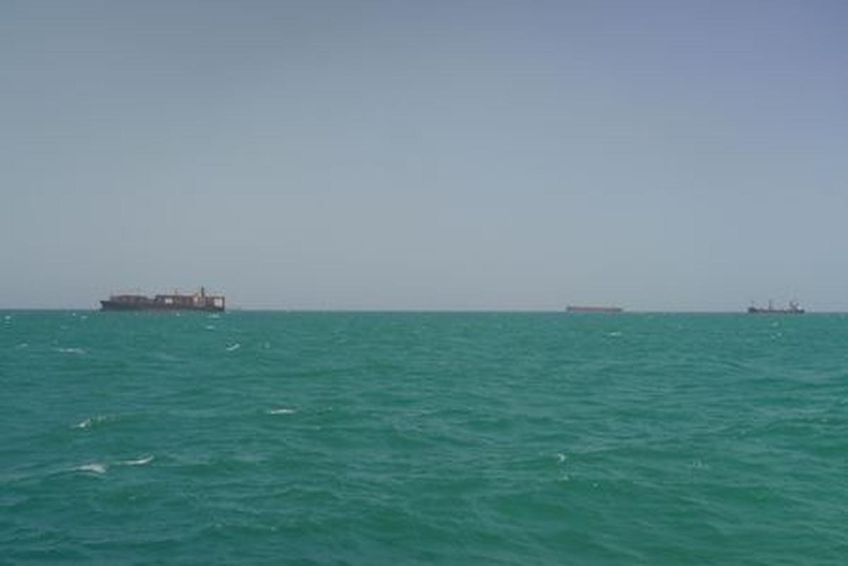 Cargo ships sail in Saudi waters near the Dammam Port in Dammam, Saudi Arabia, May 17, 2026. REUTERS/Mohammed Benmansour
