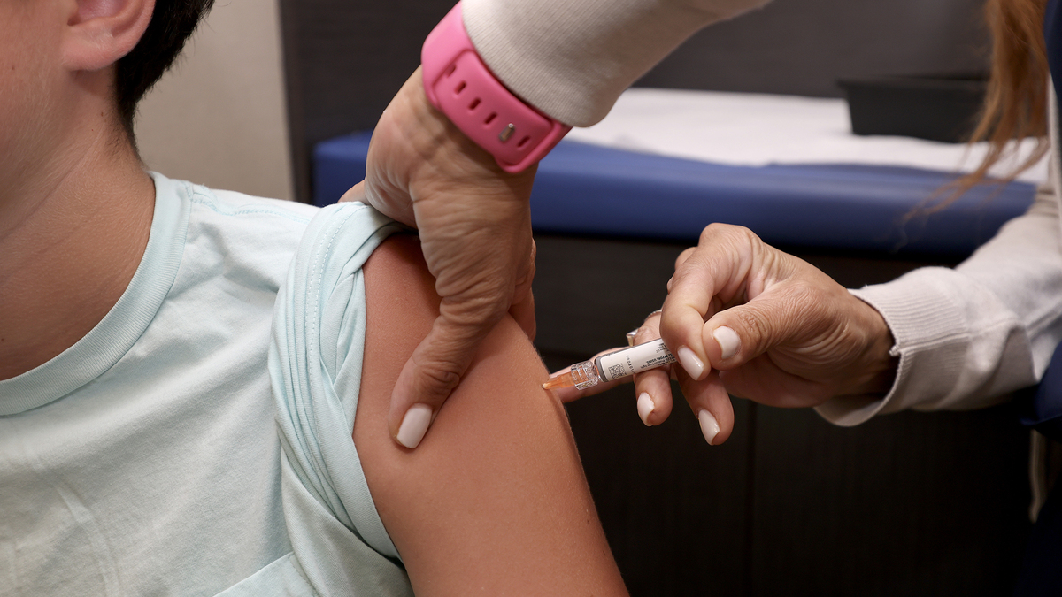 A child receives a standard immunization at Doctor Gary M. Kramer, MD, PA's Pediatric office on Sept. 15, 2025, in Coral Gables, Florida. (Joe Raedle/Getty Images/TNS)