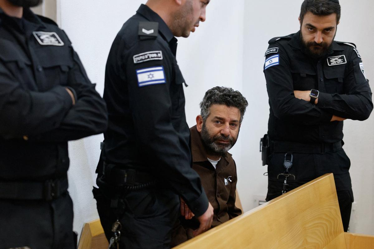 Activist Saif Abu Keshek, a Spanish national, who was detained aboard the Gaza-bound Global Sumud Flotilla, which was intercepted by Israeli forces in international waters, appears at a court in Beersheba, southern Israel May 6, 2026. REUTERS/Amir Cohen