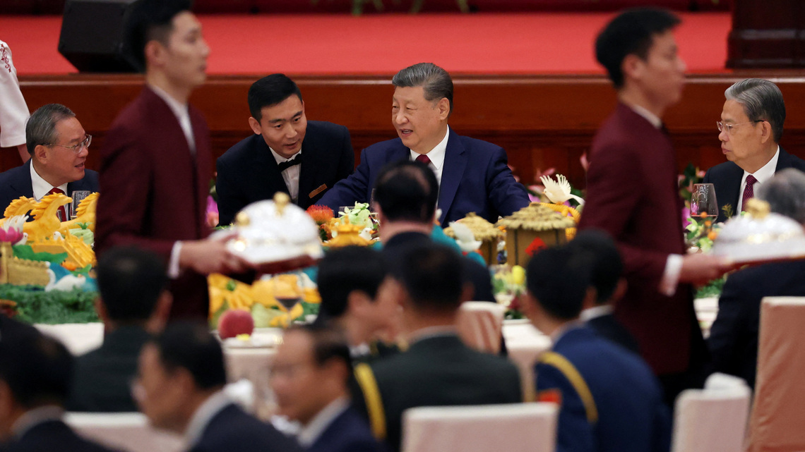 China's Xi talks economy, Taiwan at reception marking National Day 