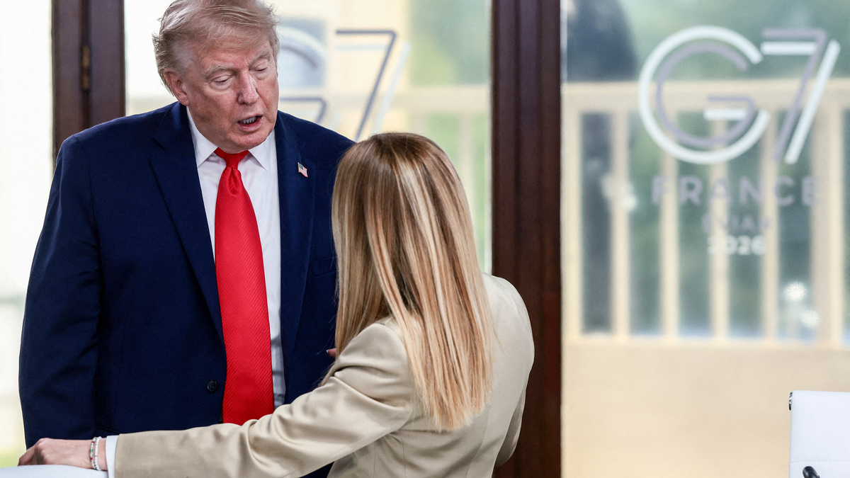 President Donald Trump speaks with Italy's Prime Minister Giorgia Meloni during a work lunch as part of the G7 summit, in Evian, France, on June 16, 2026.
