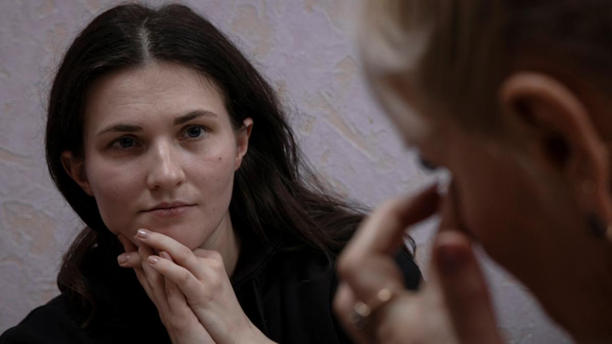 War-crimes investigator Roksolana Makar, 29, from the Ukrainian nonprofit Truth Hounds, interviews a woman who says she was tortured and raped by occupying Russian forces in 2022, in Izium, Ukraine, January 29, 2026.  REUTERS/Thomas Peter