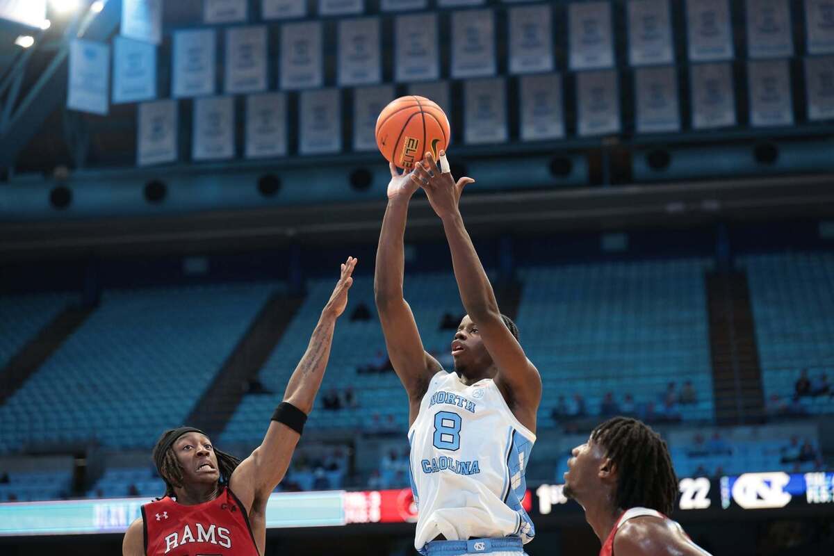  Caleb Wilson of UNC shoots over Winston-Salem State defenders in an exhibition game. (Photo courtesy: William Anthony)=