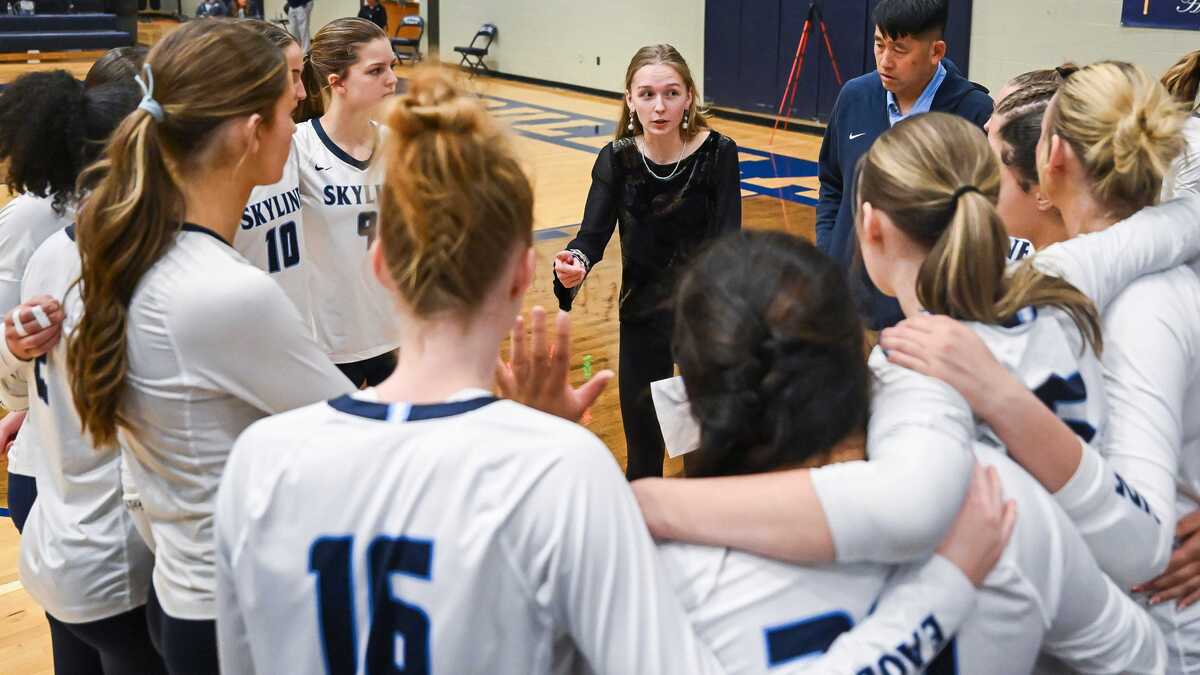 Skyline head coach Linsey Momrik, center, speaks with the team during their Div. 1 state quarterfinal loss to Byron Center on Tuesday, Nov. 18, 2025, at Gull Lake High School in Richland, Michigan. (Katy Kildee/The Detroit News/TNS)